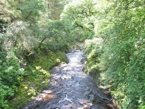SH7325 : A raging Mawddach from the Car park Bridge looking downstream