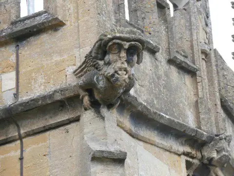 SP0228 : St Peter's Church, Winchcombe; grotesque with a hat