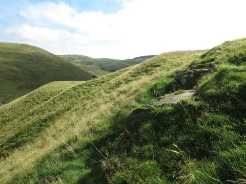 NT8511 : Rocky outcrop above the Rowhope Burn
