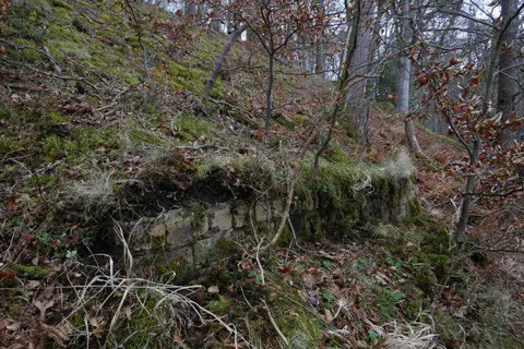 NT2340 : Brickwork of a flame trap tank above the A72, Castle Banks