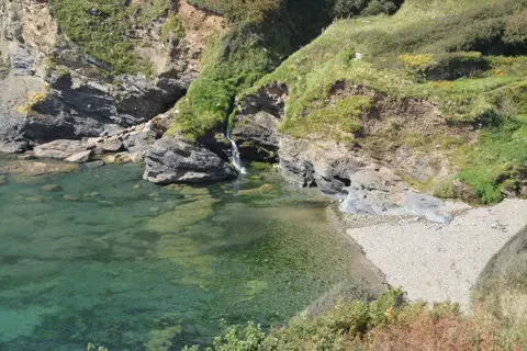 SX0348 : Coastal waterfall