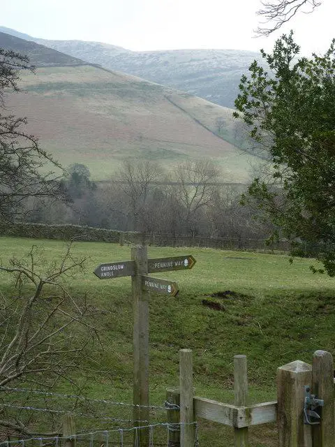SK1185 : Pennine Way signpost and hillsides above Edale