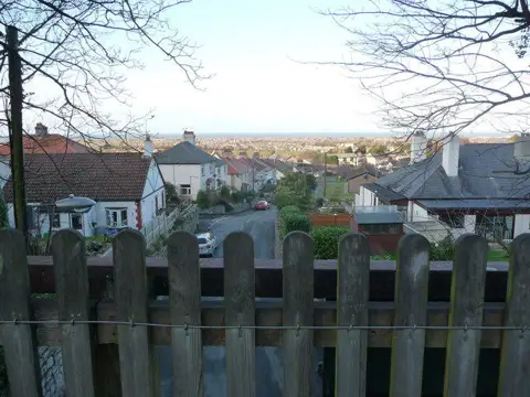 SJ0680 : View over part of Meliden from the old railway trackbed bridge